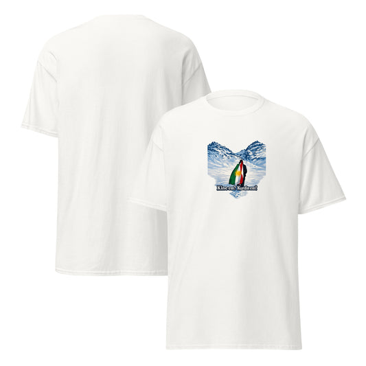 White t-shirt with snowy mountain landscape and Kurdish flag featuring the text “Kînem? Kurdim!”